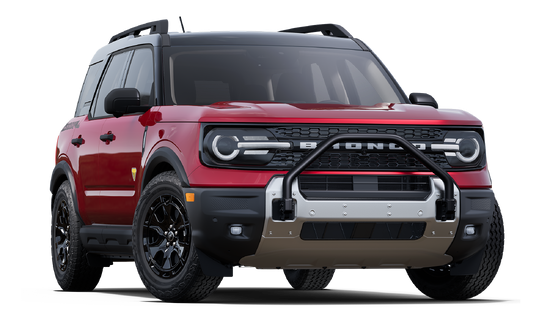 Red off-road SUV with black trim and roof rack, showcasing a robust front bumper, sleek headlights, and rugged tires, conveying a sense of adventure.